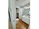 Bathroom with toilet, sink, and linen closet at 32 41St Ave, Isle of Palms, SC 29451