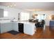 Spacious kitchen with stainless steel appliances and a view to the dining area at 32 41St Ave, Isle of Palms, SC 29451