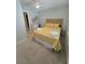 Bright bedroom with carpeted floor and a comfy bed at 32 41St Ave, Isle of Palms, SC 29451