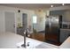 Updated kitchen featuring stainless steel appliances and white cabinetry at 32 41St Ave, Isle of Palms, SC 29451