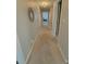 Hallway with carpet and doors to bedrooms and bathroom at 32 41St Ave, Isle of Palms, SC 29451