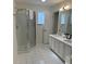 Bathroom with double vanity, shower, and bathtub at 32 41St Ave, Isle of Palms, SC 29451