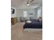 Main bedroom with king bed, two armchairs, and dresser at 32 41St Ave, Isle of Palms, SC 29451
