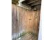 Rustic outdoor shower with wooden walls and flooring at 32 41St Ave, Isle of Palms, SC 29451