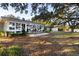 Home with sunroom, deck, and expansive backyard at 3531 Old Ferry Rd, Johns Island, SC 29455