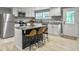 Updated kitchen featuring a kitchen island and white cabinets at 107 Hiers Corner Rd, Walterboro, SC 29488