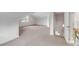 Spacious attic bedroom with neutral carpeting and ample natural light at 517 Royall Ave, Mount Pleasant, SC 29464