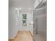 Bright kitchen pantry with white cabinets and hardwood floors at 517 Royall Ave, Mount Pleasant, SC 29464