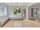 Bright breakfast nook with built-in bench seating at 517 Royall Ave, Mount Pleasant, SC 29464