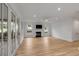 Light and airy living room with hardwood floors and fireplace at 517 Royall Ave, Mount Pleasant, SC 29464