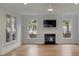 Spacious living room with fireplace and hardwood floors at 517 Royall Ave, Mount Pleasant, SC 29464