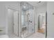 Luxurious shower with glass enclosure, marble walls, and rainfall shower head at 517 Royall Ave, Mount Pleasant, SC 29464
