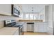 Bright kitchen with stainless steel appliances and an eat-in area at 1206 Creek Stone Way, Hanahan, SC 29410