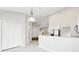 Kitchen features white cabinets and a breakfast bar at 1206 Creek Stone Way, Hanahan, SC 29410