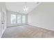 Large bedroom with carpet flooring and plenty of natural light at 1206 Creek Stone Way, Hanahan, SC 29410