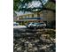 Building exterior showcasing a two-story brick building with ample parking at 2150 Spoleto Ln # B-6, North Charleston, SC 29406