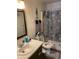 Clean bathroom with starfish-themed shower curtain and updated vanity at 2150 Spoleto Ln # B-6, North Charleston, SC 29406