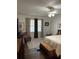 Large bedroom with ceiling fan, hardwood floors, and neutral decor at 2150 Spoleto Ln # B-3, North Charleston, SC 29406
