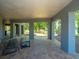 Covered patio with brick flooring and comfortable seating at 4233 Haulover Dr, Johns Island, SC 29455