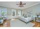 Large main bedroom with hardwood floors, tray ceiling, and plenty of natural light at 4233 Haulover Dr, Johns Island, SC 29455