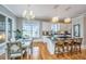 Modern kitchen with white cabinets, granite island, and stainless steel appliances at 4233 Haulover Dr, Johns Island, SC 29455