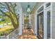 Relaxing front porch with seating area and view of the street at 4233 Haulover Dr, Johns Island, SC 29455