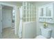 Clean bathroom with glass block shower and white vanity at 4233 Haulover Dr, Johns Island, SC 29455
