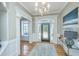 Bright and spacious entryway with hardwood floors and chandelier at 4233 Haulover Dr, Johns Island, SC 29455