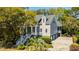Two-story home with driveway and detached garage at 4233 Haulover Dr, Johns Island, SC 29455