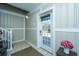 Inviting entryway with tiled floor, white door, and staircase at 4233 Haulover Dr, Johns Island, SC 29455