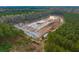 Aerial view of a large flooded wetland area surrounded by trees at 4285 Clover Hill Rd, Green Pond, SC 29446