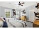 Two twin beds in a room with mounted wildlife and wood flooring at 4285 Clover Hill Rd, Green Pond, SC 29446