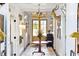 Long hallway with hardwood floors and unique decor at 4285 Clover Hill Rd, Green Pond, SC 29446