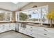 Modern kitchen with farmhouse sink and water views at 4285 Clover Hill Rd, Green Pond, SC 29446
