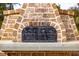 Outdoor brick oven with black metal door at 4285 Clover Hill Rd, Green Pond, SC 29446