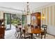 Spacious dining room with hardwood floors, a large table, and French doors at 4285 Clover Hill Rd, Green Pond, SC 29446