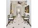 Bright hallway with white shiplap walls, a tiled floor, and ceiling fan at 4285 Clover Hill Rd, Green Pond, SC 29446