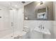 Modern bathroom with white herringbone tile and glass shower at 4285 Clover Hill Rd, Green Pond, SC 29446
