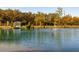 Pond with gazebo and fountain, surrounded by trees at 4285 Clover Hill Rd, Green Pond, SC 29446