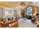 Cozy living room featuring leather sofas and wooden accents at 4285 Clover Hill Rd, Green Pond, SC 29446
