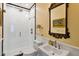 Small bathroom with yellow striped walls and white fixtures at 4285 Clover Hill Rd, Green Pond, SC 29446