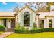 House exterior featuring a large window with shutters and a metal roof at 4285 Clover Hill Rd, Green Pond, SC 29446