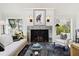 Modern fireplace with a dramatic eagle artwork above at 4285 Clover Hill Rd, Green Pond, SC 29446