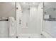 Elegant bathroom with glass shower, herringbone tile, and modern fixtures at 4285 Clover Hill Rd, Green Pond, SC 29446