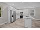 Modern kitchen with white cabinets, stainless steel appliances, and granite countertops at 168 Aleene Dr, Summerville, SC 29485