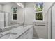 Bathroom with double vanity, granite countertop and large mirror at 168 Aleene Dr, Summerville, SC 29485