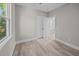Bright bedroom with hardwood floors and ensuite bathroom access at 168 Aleene Dr, Summerville, SC 29485