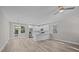 Open concept kitchen with white cabinets, a large island, and stainless steel appliances at 168 Aleene Dr, Summerville, SC 29485