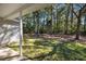 Spacious backyard with mature trees and grassy area at 168 Aleene Dr, Summerville, SC 29485
