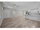 Spacious living room with wood-look floors and access to the kitchen at 168 Aleene Dr, Summerville, SC 29485